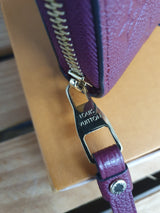 Original Louis Vuitton Geldbörse Zippy Empreinte Leder Aurore