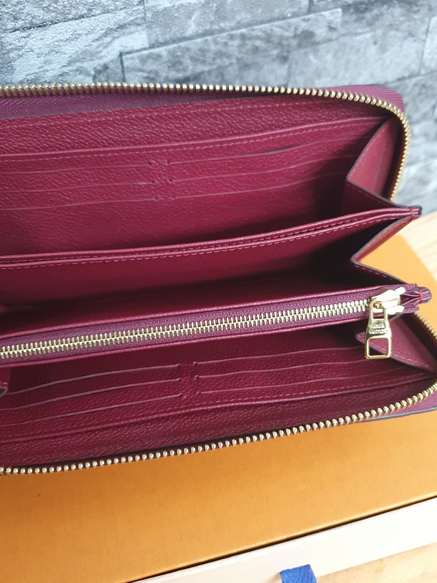 Original Louis Vuitton Geldbörse Zippy Empreinte Leder Aurore
