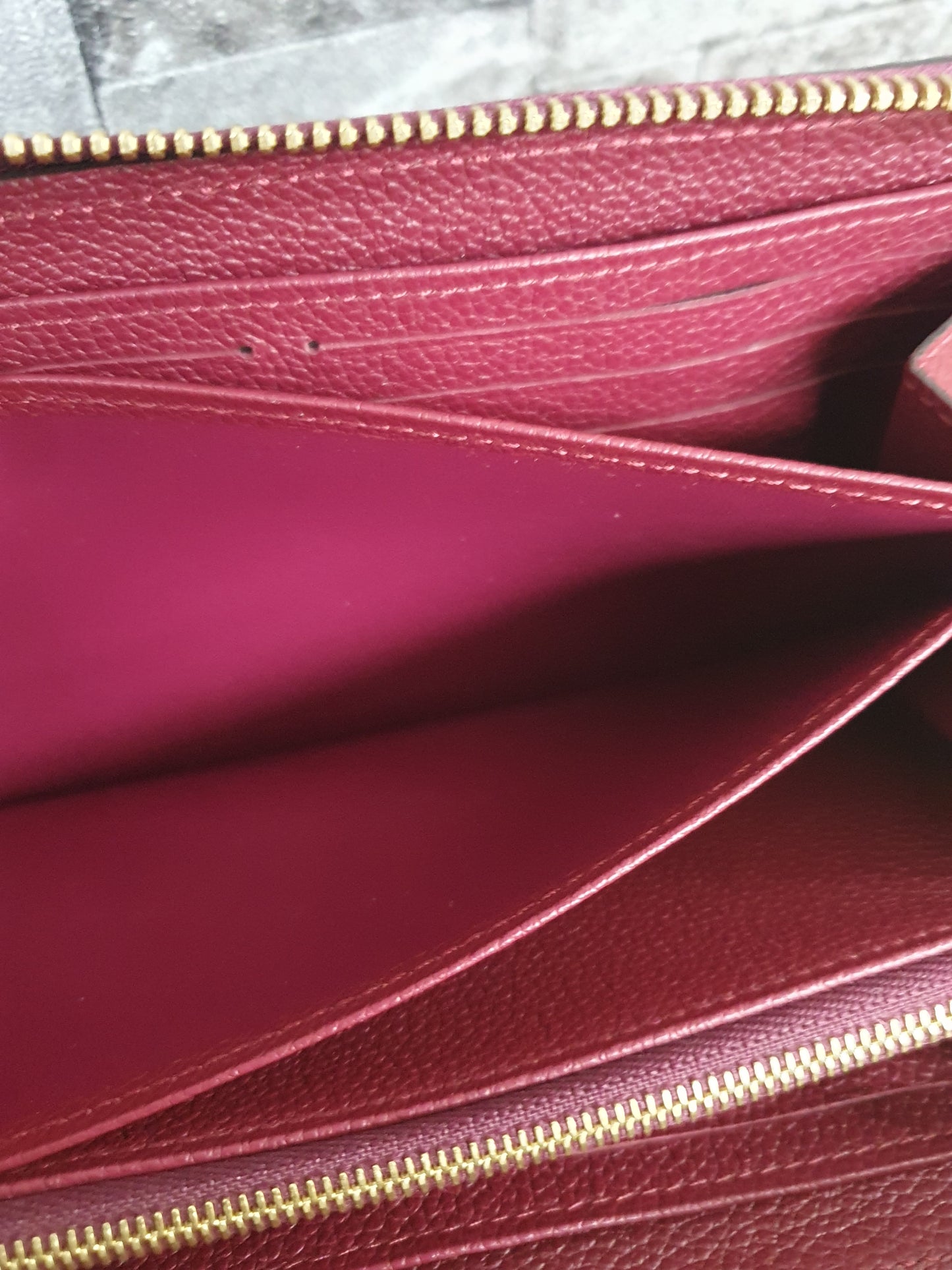 Original Louis Vuitton Geldbörse Zippy Empreinte Leder Aurore